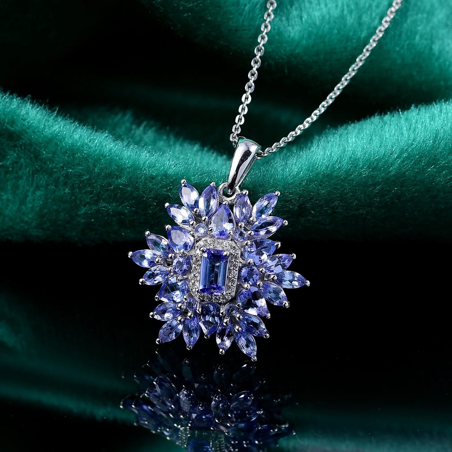 Tanzanite & White Zircon Pendant – Floral Elegance in Rhodium Silver
