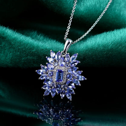 Tanzanite & White Zircon Pendant – Floral Elegance in Rhodium Silver