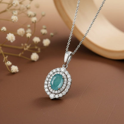 Grandidierite and Moissanite Halo Pendant – Calm, Clarity and Balance