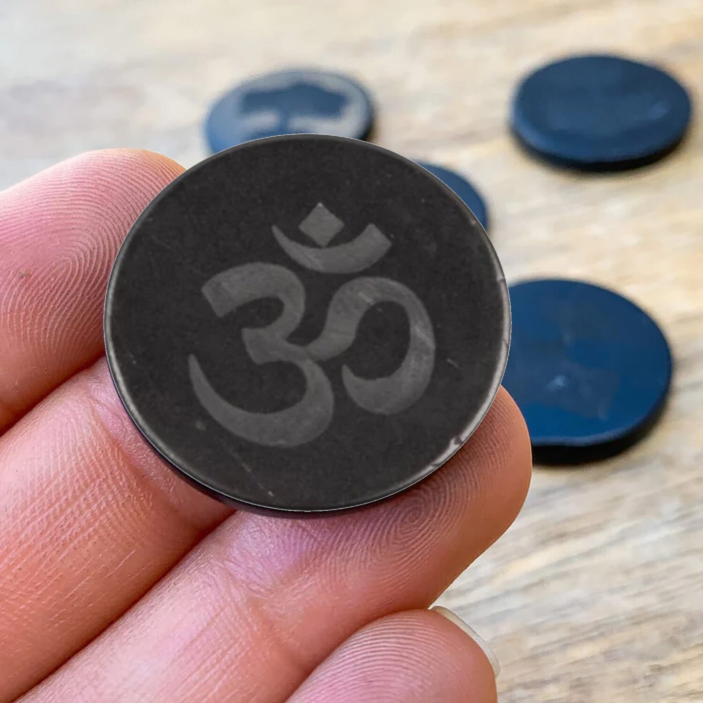 Shungite OM Round Tile – Enhance Your Space with Energy and Harmony
