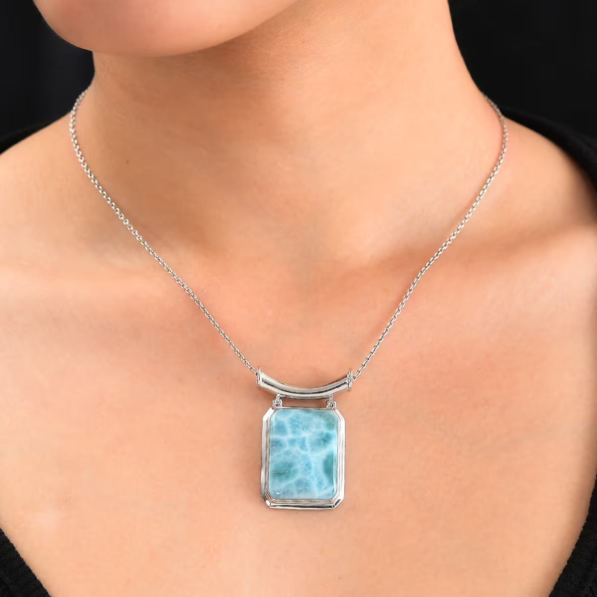 Larimar Solitaire Pendant in Rhodium Over Sterling Silver – An Emblem for Peace