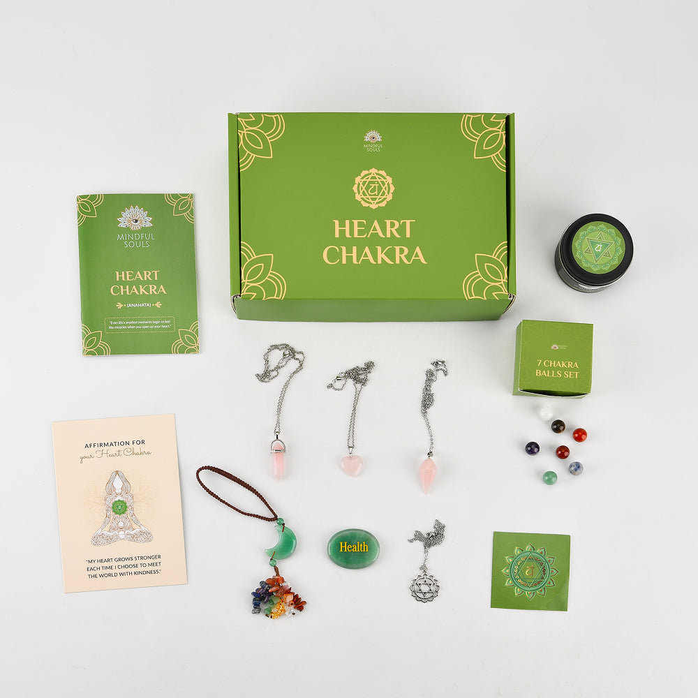 Heart Chakra wellness kit with various items on a white background