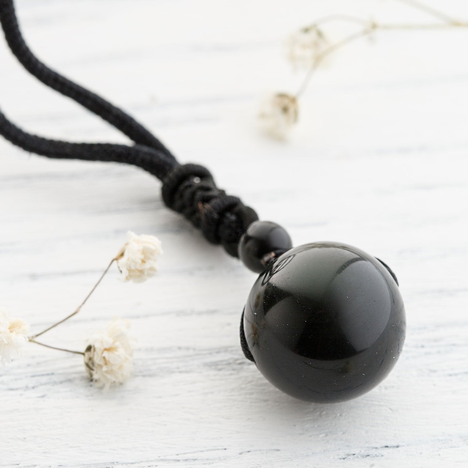 Wearing deals obsidian necklace